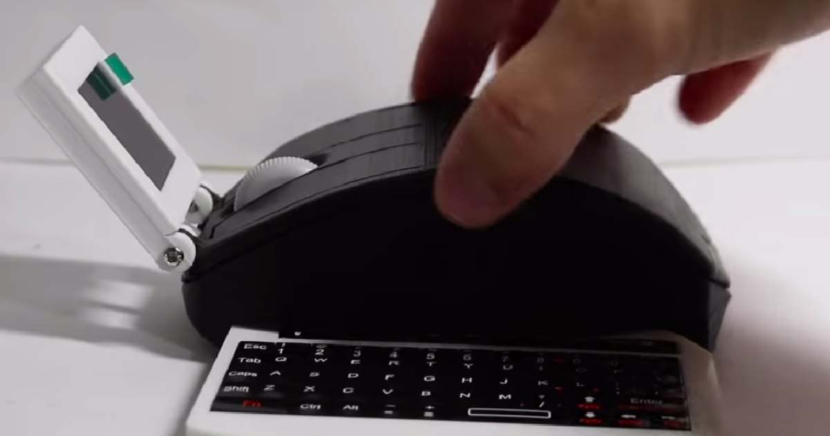 Энтузиаст создал миниатюрный компьютер в корпусе размером с мышку, у которого есть небольшой экран и выдвижная клавиатура