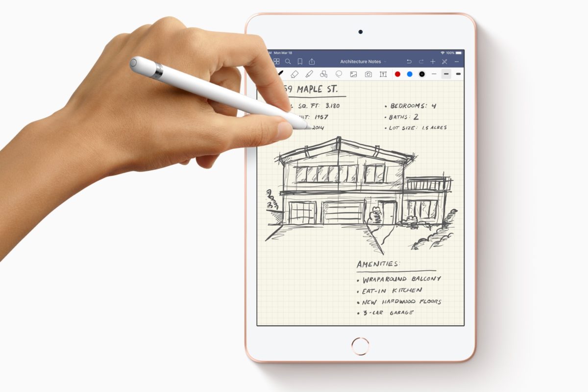 New iPad Mini Apple Pencil with hands drawing New iPad Mini Apple Pencil with hands drawing
